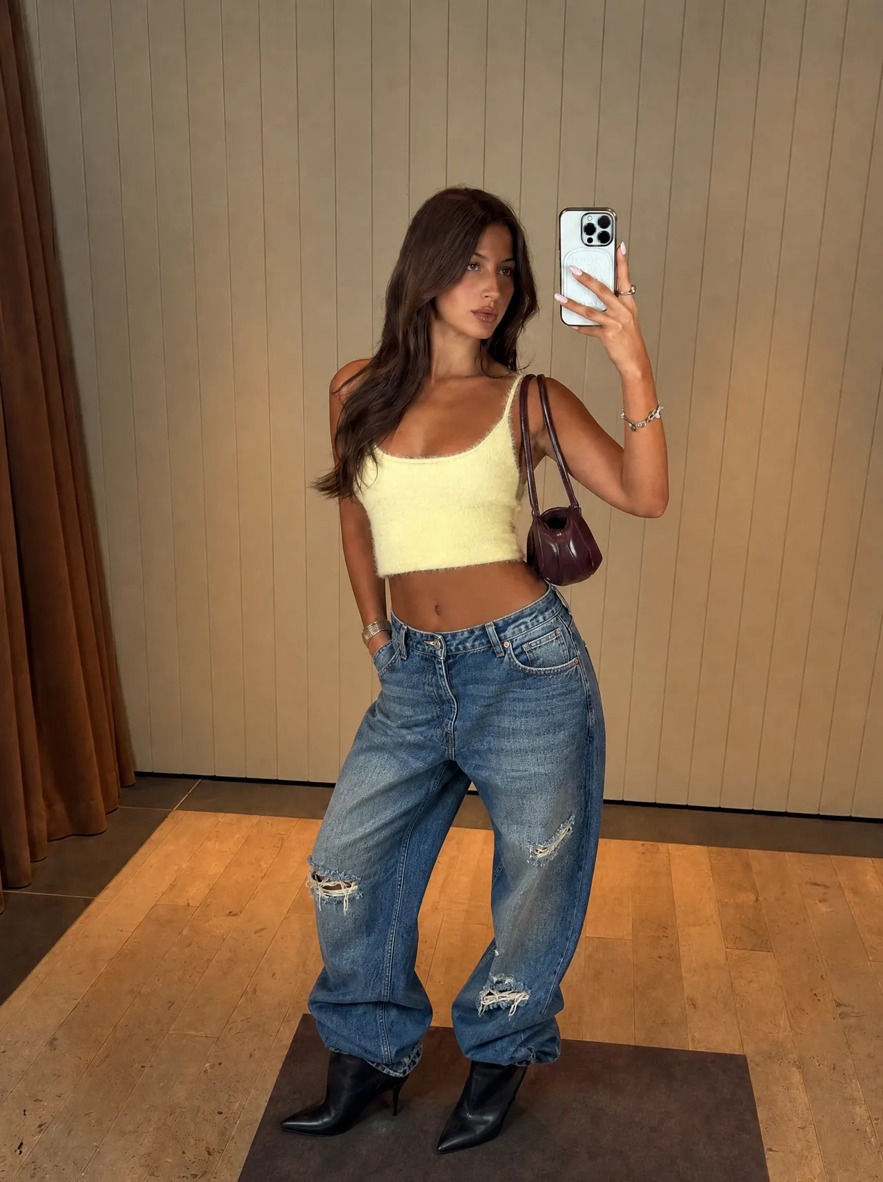 Virtual try-on of a Fluff top and Wide jeans Outfit on the customer