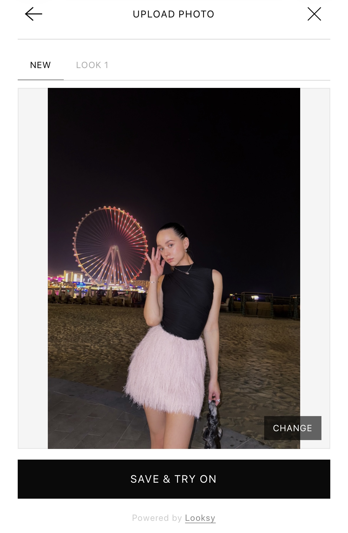 Shopper uploading a full-length photo to the Looksy AI virtual fitting room