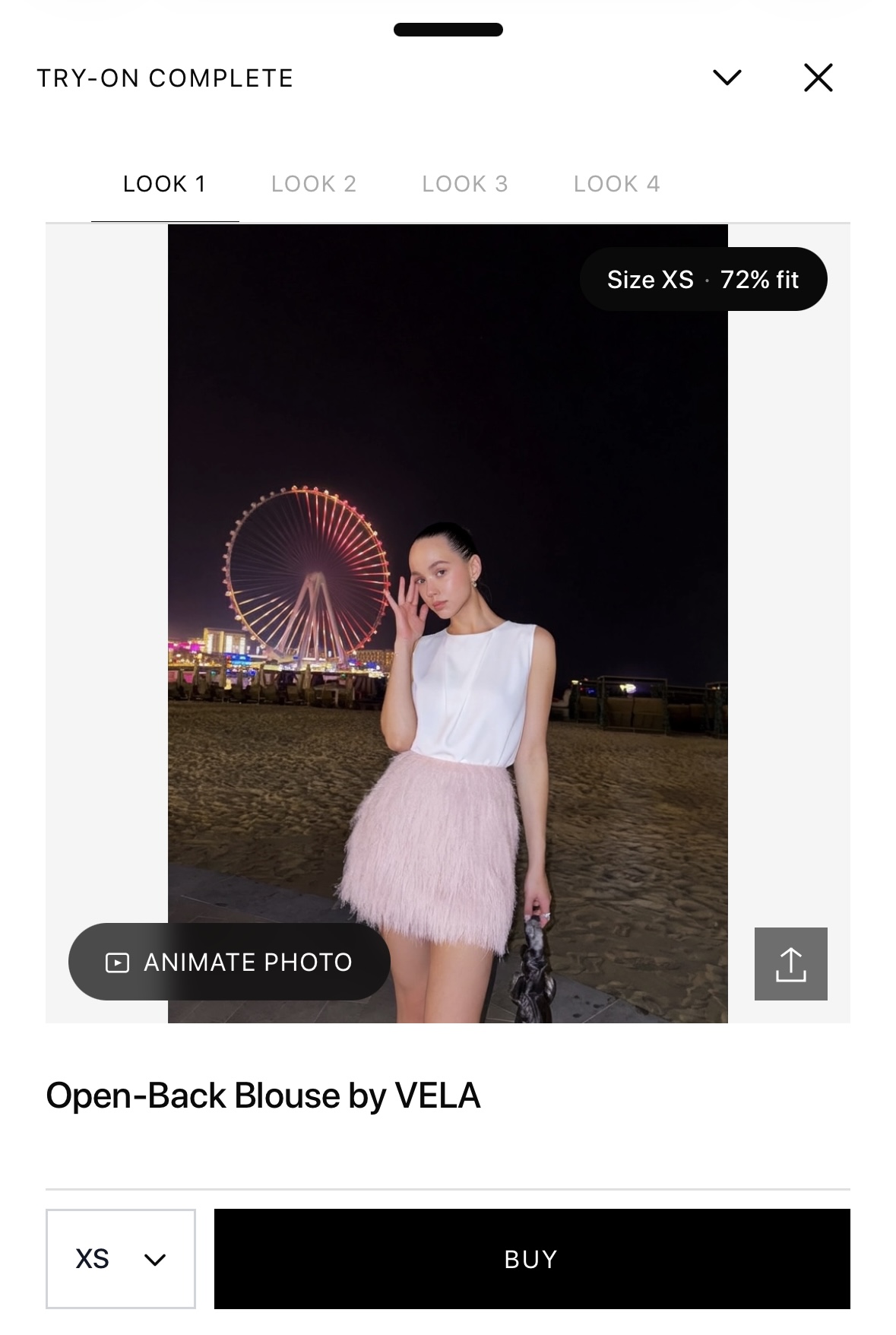 Looksy AI virtual try-on result showing a white blouse with an XS size recommendation